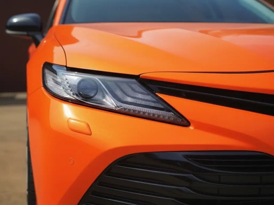 Toyota Camry wrapped in Hexis Gloss HX20000 Orange Red wrap film HX20165B