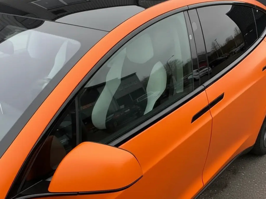 Tesla X wrapped in Matte HX20000 Mandarin Red car wrap film HX20165M