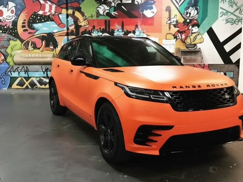 Range Rover Velar wrapped in Hexis Matte HX20000 Mandarin Red wrap film HX20165M