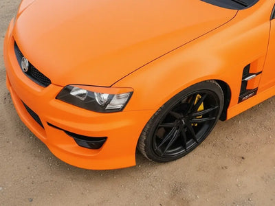 Holden Commodore wrapped in Hexis Matte HX20000 Mandarin Red wrap film HX20165M