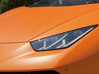 Lamborghini Huracán wrapped in Matte HX20000 Mandarin Red restyling film HX20165M