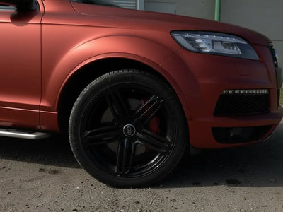 Audi Q7 wrapped in Hexis Satin HX20000 Red Aluminum restyling film HX20196S