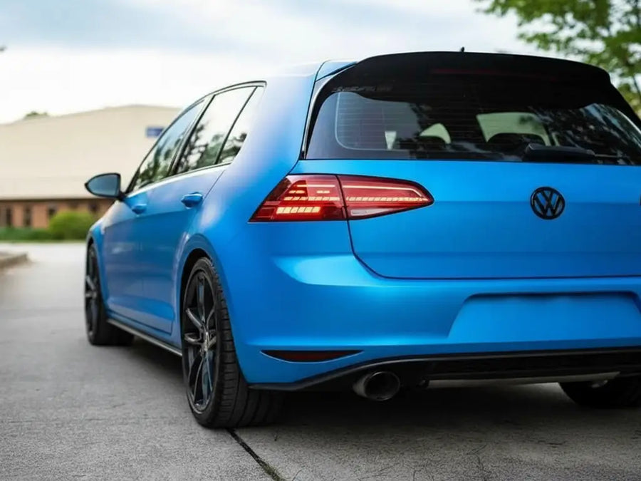 Volkswagen Golf wrapped in Hexis Satin HX20000 Ara Blue automotive vinyl film HX20219S