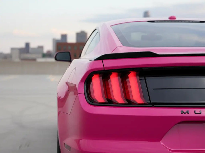 Ford Mustang wrapped in Hexis Gloss HX20000 Fuchsia car wrap film HX20220B