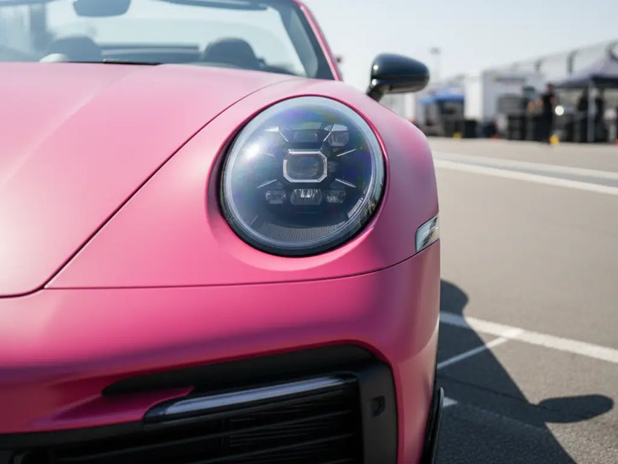 Porsche 911 wrapped in Matte HX20000 Fuchsia car wrap film HX20220M