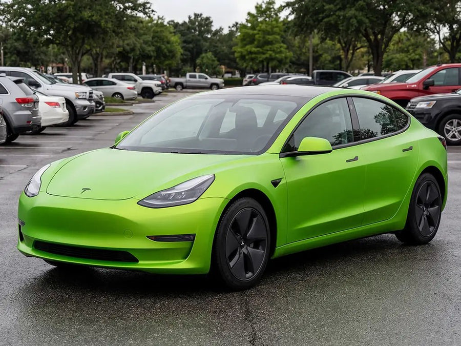 Tesla 3 wrapped in Hexis Matte HX20000 Wasabi Green restyling film HX20375M