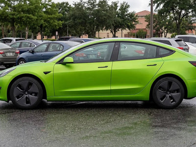 Tesla 3 wrapped in Hexis Matte HX20000 Wasabi Green automotive vinyl film HX20375M