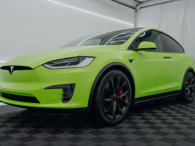 Tesla X wrapped in Hexis Satin HX20000 Acid Green restyling film HX20266S