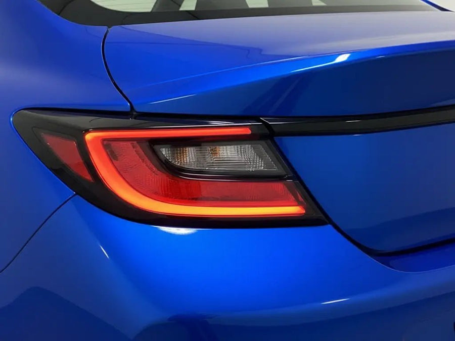Nissan Z wrapped in Hexis Gloss HX20000 Pacific Blue wrap film HX20280B