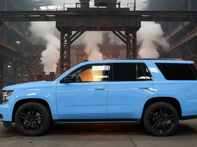 Chevrolet Tahoe wrapped in Hexis Gloss HX20000 Niagara Blue car wrap film HX20284B
