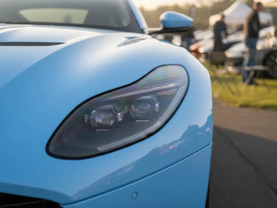 Aston Martin Vantage wrapped in Gloss HX20000 Niagara Blue automotive vinyl film HX20284B