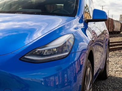 Tesla Y wrapped in Hexis Gloss HX20000 Intense Blue wrap film HX20293B
