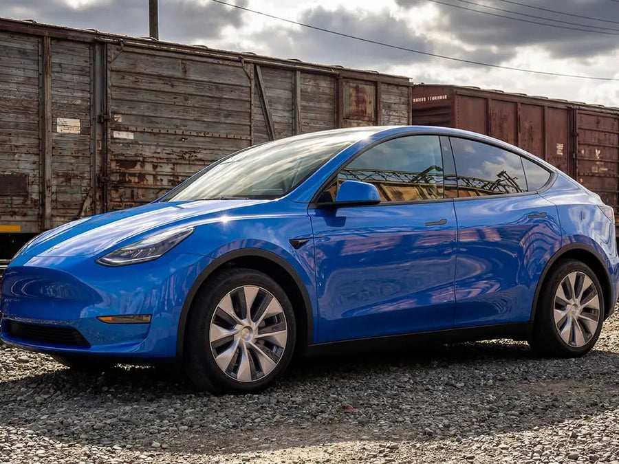 Tesla Y wrapped in Gloss HX20000 Intense Blue car wrap film HX20293B