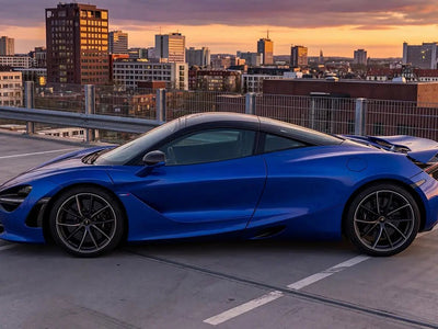 McLaren 720S wrapped in Hexis Gloss HX20000 Sapphire Blue automotive vinyl film HX20300B