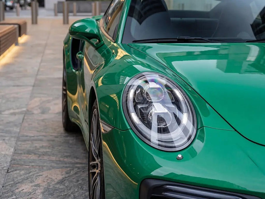 Porsche 911 wrapped in Gloss HX20000 Emerald Green car wrap film HX20348B