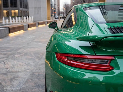 Porsche 911 wrapped in Hexis Gloss HX20000 Emerald Green car wrap film HX20348B