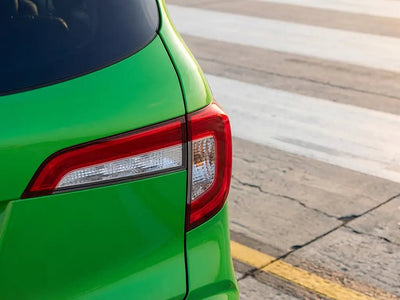 Car wrapped in Gloss HX20000 Apple Green restyling film HX20369B