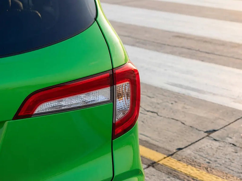Car wrapped in Gloss HX20000 Apple Green restyling film HX20369B
