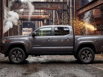 Toyota Tacoma wrapped in Hexis Gloss HX20000 Shark Grey vinyl wrap HX20423B