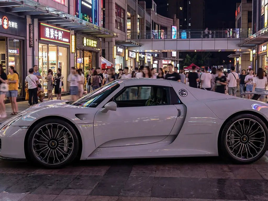 Porsche 918 Spyder wrapped in Hexis Gloss HX20000 Cloud Grey automotive vinyl film HX20428B