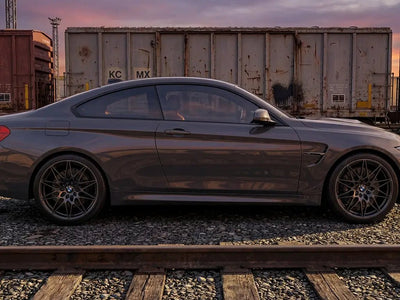 BMW M4 wrapped in Gloss HX20000 Dark Grey restyling film HX20432B