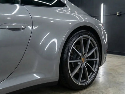 Porsche 911 wrapped in Hexis Gloss HX20000 Pearl Grey car wrap film HX20445B