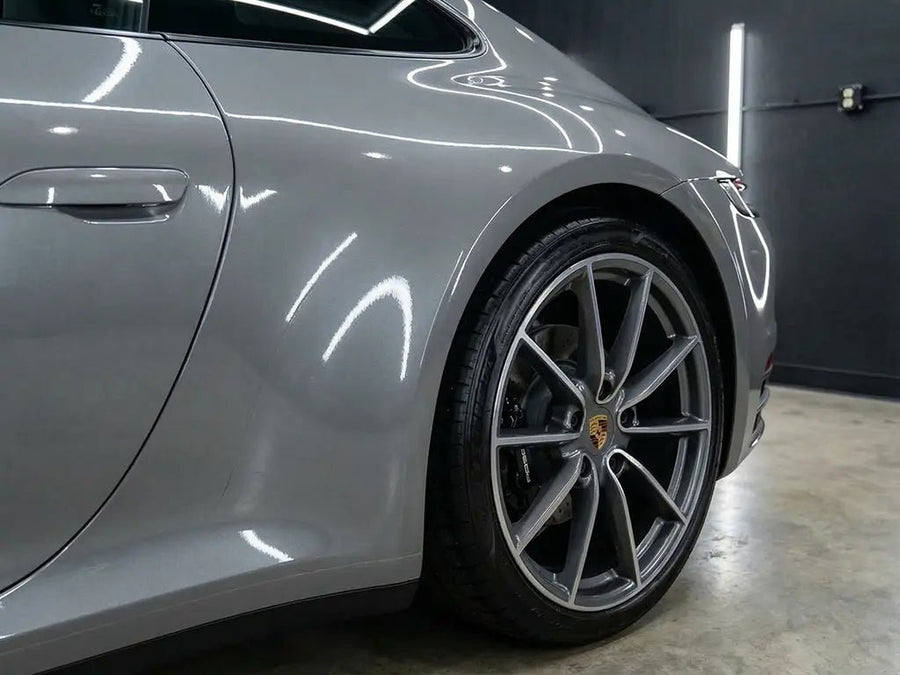 Porsche 911 wrapped in Hexis Gloss HX20000 Pearl Grey car wrap film HX20445B