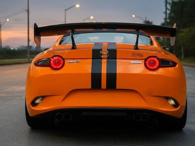 Mazda MX-5 Miata wrapped in Hexis Gloss HX20000 Urban Orange wrap film HX20495B