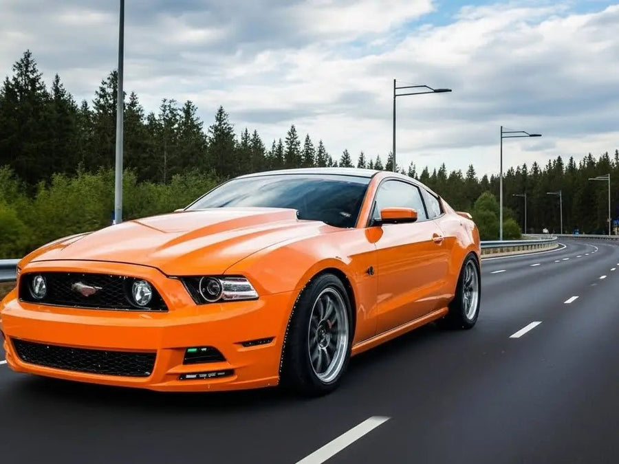 Ford Mustang wrapped in Gloss HX20000 Urban Orange automotive vinyl film HX20495B detail