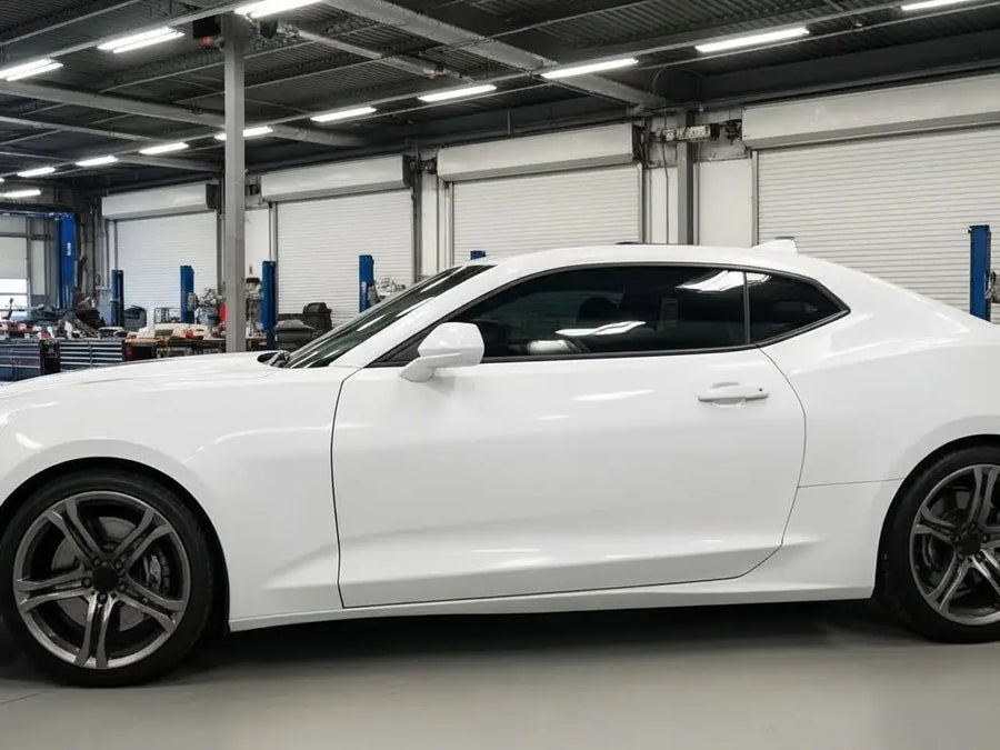 Chevrolet Camaro wrapped in Gloss HX20000 Ice White automotive vinyl film HX20500B