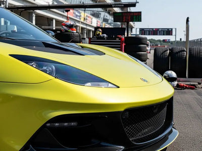Lotus Emira wrapped in Gloss HX20000 Metallic Metallic Yellow vinyl wrap HX20558B