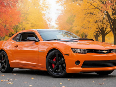 Chevrolet Camaro wrapped in Hexis Gloss HX20000 Orange Zenith car wrap film HX20585B