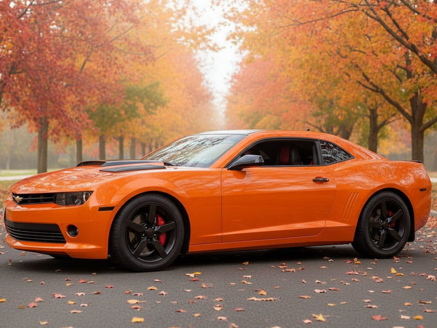Chevrolet Camaro wrapped in Hexis Gloss HX20000 Orange Zenith restyling film HX20585B