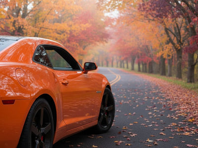 Chevrolet Camaro wrapped in Gloss HX20000 Orange Zenith automotive vinyl film HX20585B