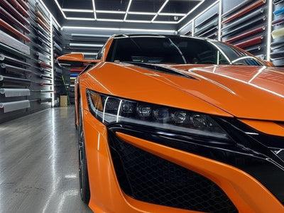 Acura NSX wrapped in Hexis Gloss HX20000 Orange Zenith vinyl wrap HX20585B