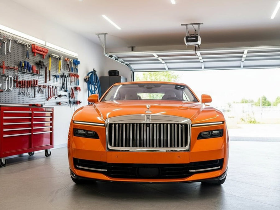 Rolls-Royce Ghost wrapped in Hexis Gloss HX20000 Orange Zenith vinyl wrap HX20585B