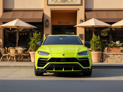 Lamborghini Urus wrapped in Hexis Gloss HX20000 Fluorescent Yellow restyling film HX20613B