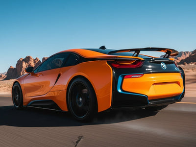 BMW i8 wrapped in Hexis Gloss HX20000 Fluorescent Orange wrap film HX20614B