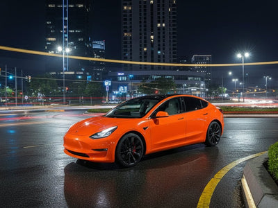 Tesla 3 wrapped in Gloss HX20000 Fluorescent Orange vinyl wrap HX20614B