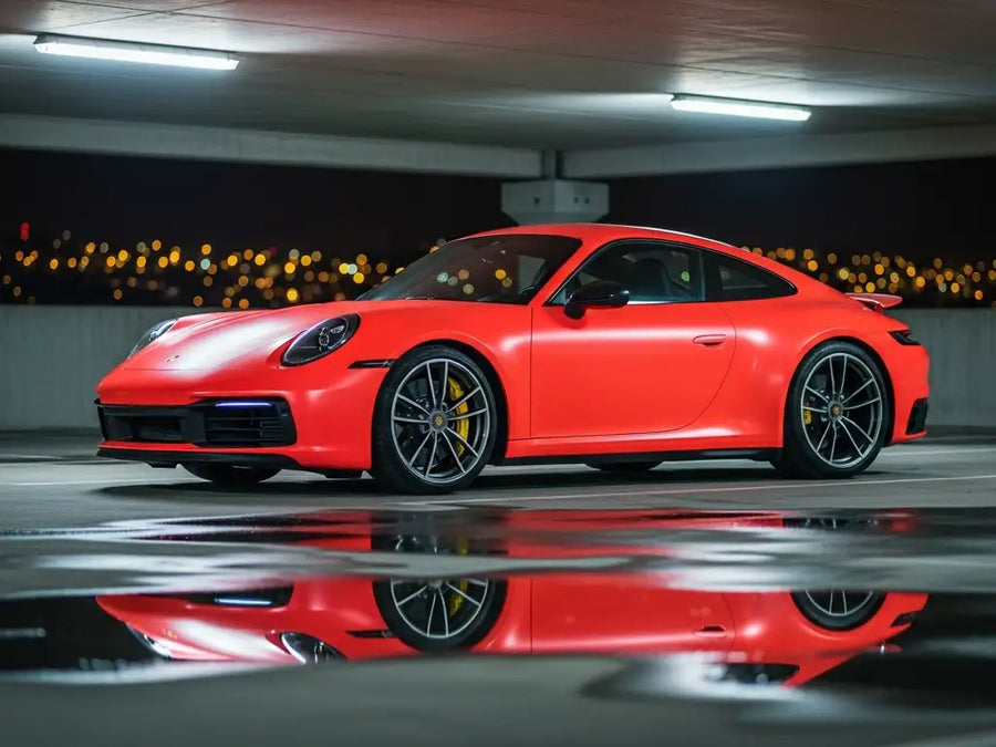 Porsche 911 wrapped in Satin HX20000 Fluorescent Red restyling film HX20615S