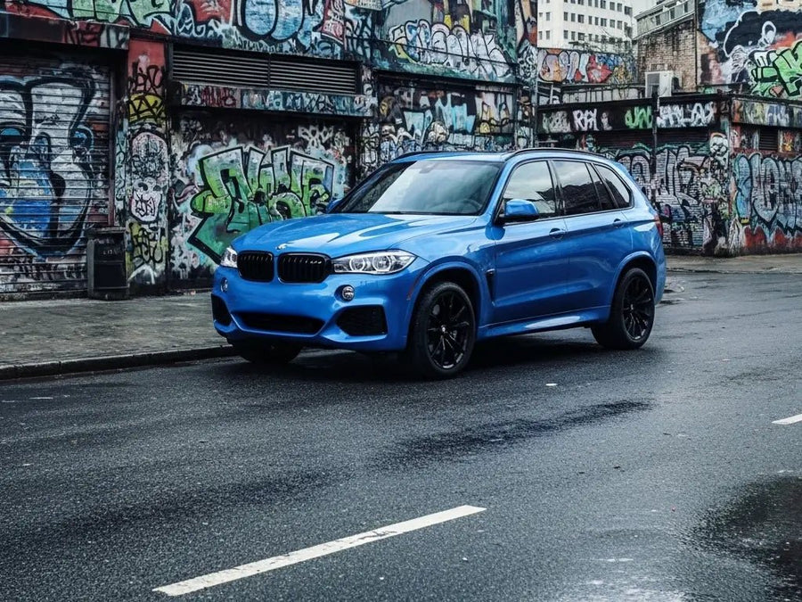BMW X5 wrapped in Hexis Gloss HX20000 Metallic Yas Marina Blue wrap film HX20646B