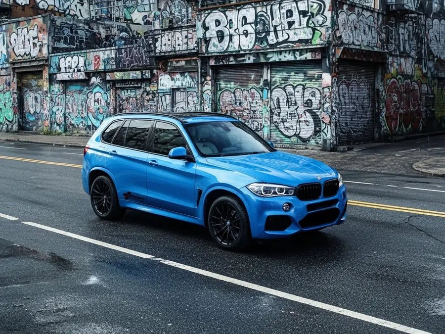 BMW X5 wrapped in Gloss HX20000 Metallic Yas Marina Blue restyling film HX20646B