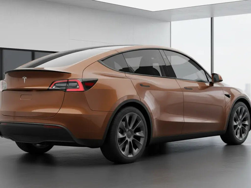 Tesla Y wrapped in Gloss HX20000 Canyon Bronze Metal car wrap film HX20661B