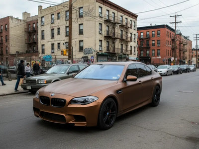 BMW M5 wrapped in Satin HX20000 Metallic Canyon Copper restyling film HX20661S