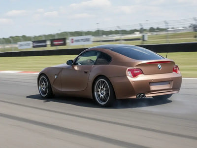 BMW Z4 Coupe wrapped in Hexis Satin HX20000 Metallic Canyon Copper vinyl wrap HX20661S