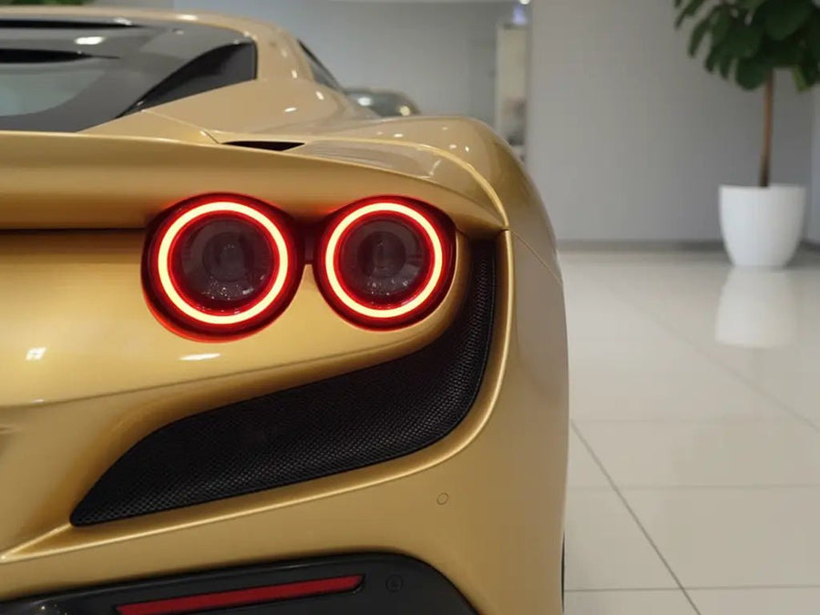 Ferrari F8 Tributo wrapped in Gloss HX20000 Gold restyling film HX20871B