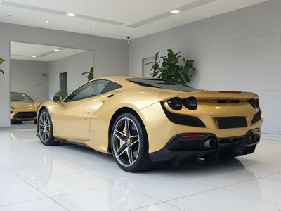 Ferrari F8 Tributo wrapped in Hexis Gloss HX20000 Gold restyling film HX20871B