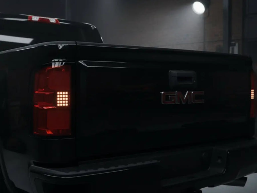 GMC Sierra wrapped in Hexis Gloss HX20000 Coal Black wrap film HX20889B