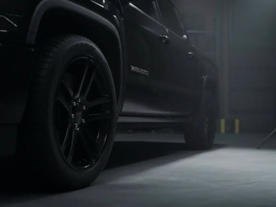 GMC Sierra wrapped in Gloss HX20000 Coal Black restyling film HX20889B