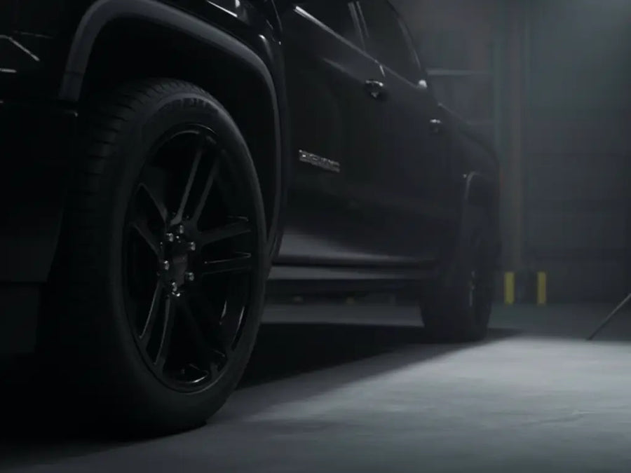 GMC Sierra wrapped in Gloss HX20000 Coal Black restyling film HX20889B